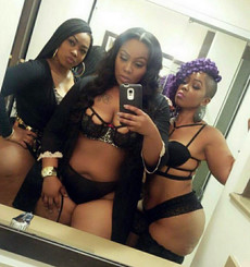 Professional black strippers posing and shaking