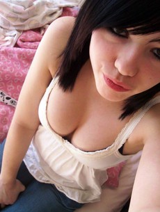 Young emo girl with short hair. Just look into